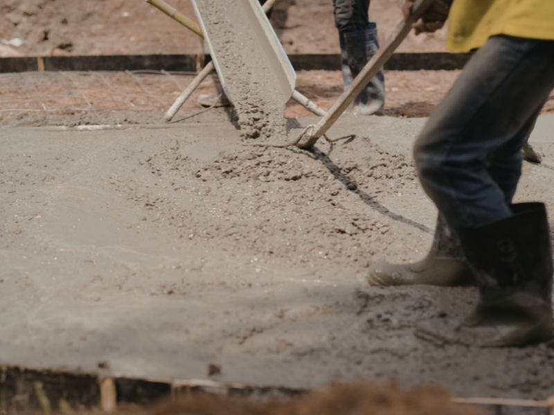 pouring fresh concrete for a foundation or driveway in San Antonio, TX