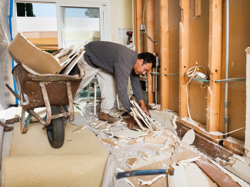 contractor cleaning up construction site in San Antonio, TX